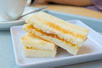 kaya toast with a cup of tea on table 