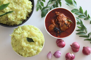 Mashed tapioca served with pomfret fish curry. Boiled and strained tapioca pieces mashed with spiced coconut taste best with fish curry prepared in Kerala style