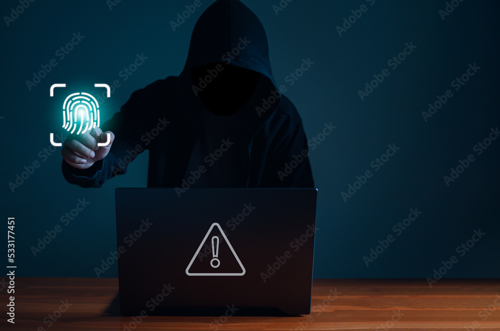 Poster hackers work on laptops in the dark. the concept of information security in the internet network and