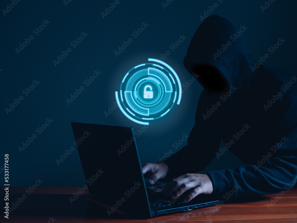Aufkleber hackers work on laptops in the dark. the concept of information security in the internet network and