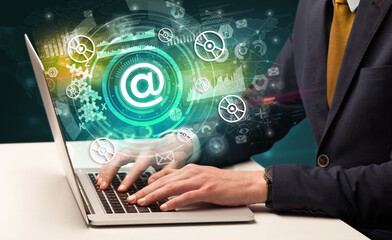 Business hand typing on a modern laptop concept