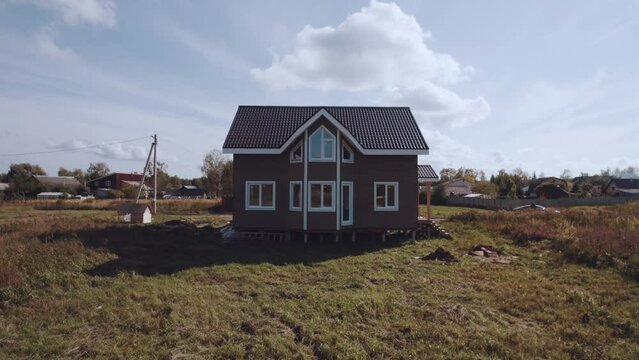 Aerial photography of a new house in a Russian village, newly built private house, construction of houses