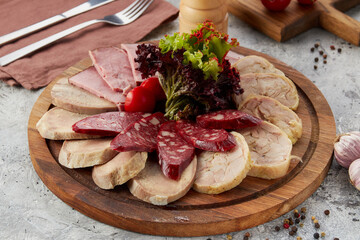 Marble cutting board with salami and, meat platter