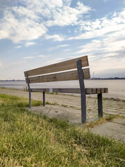 Fototapeta na wymiar bench on the shore