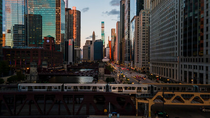 aerial drone view of the Chicago river during sunset and Chicagohenge. during golden hour the sun...