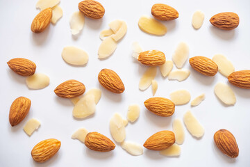 Almonds and almonds slice on white background
