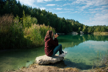 woman photographing the landscape