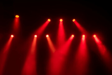 Red lights and smoke on stage in the concert - Powered by Adobe