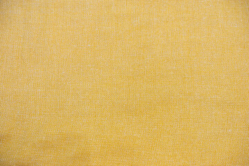 Close up of light yellow cotton fabric for texture background