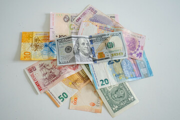 Obraz na płótnie Canvas Banknotes from different currencies on white background