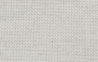 The texture of uneven natural cotton fabric, abstract background. 