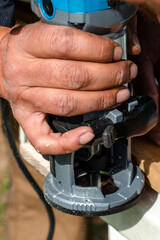 Woodworking shank router bit. Shaping copying shank router bit clamped in chuck of a working machine tool.