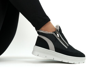 legs in black shoes isolated on white background