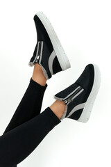 legs in black shoes isolated on white background