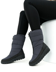 legs in gray shoes isolated on white background