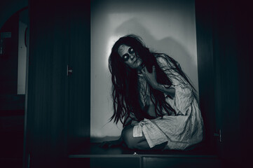 Portrait of asian woman make up ghost,Scary horror scene for background,Halloween festival...
