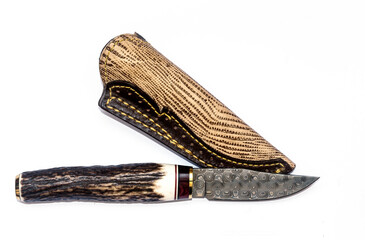 The bowie knighf from Spain. it made from damask steel with the rustic bone handle. The leather...