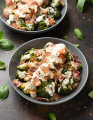 Baked chicken, broccoli with creamy cheese sauce and bacon