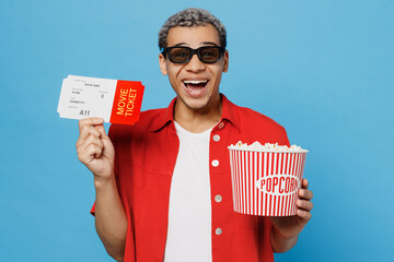 Young excited cheerful cool happy overjoyed fun man of African American ethnicity in 3d glasses...
