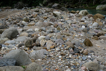 rocks in the river in the tropics of Indonesia   