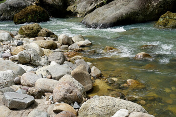 river with rocks in tropical indonesian nature    