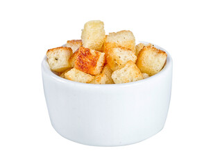 Crouton stack in a porcelain bowl and scattered isolated over white background.