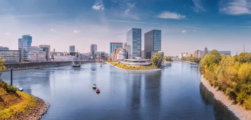 Panoramic view of Famous and popular post industrial hipster district in the city of Dusseldorf is Media Harbor or Medienhafen. Now built up with hotels and offices, in the past - a busy port © EdNurg