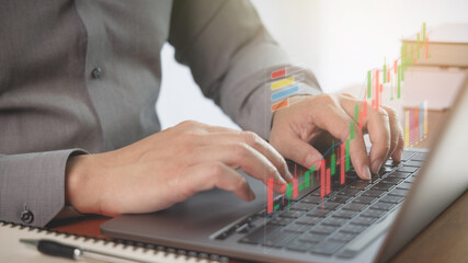 Business people analyzing financial data chart stock trading, investing in forex, crypto, mutual fund and digital assets concept. Investor view 2023 wealth analysis trend report online with laptop.