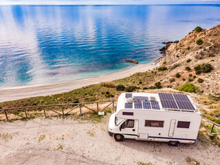Rv camper on spanish coast. Aerial view - obrazy, fototapety, plakaty
