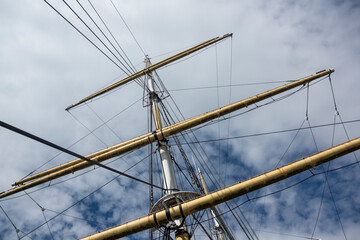 Ship mast over sky
