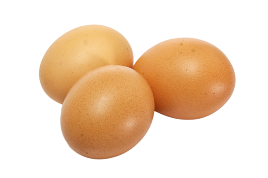 Three eggs lying down on a white