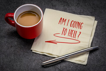 Am I going to hell? A question handwritten on a napkin with a cup of coffee. Damnation and eternal punishment concept.