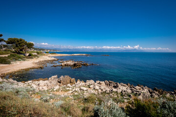 Fototapeta premium Landscape view along the old coastal village and fortification of Antibes on the french riviera in France