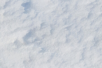 Obraz premium Snow texture, snow cover with uneven surface