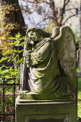 Historic Statue on the mystery old Prague Cemetery, Czech Republic