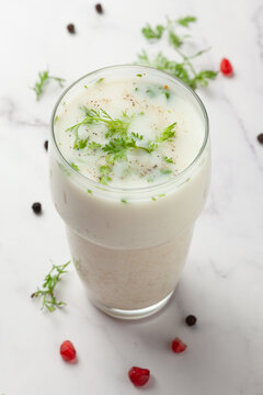 Close-Up of summer drink  Buttermilk or mattha or Chhachh glass garnished with coriander made with milk and curd.