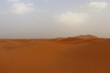 Fototapeta na wymiar Red sand dunes in the Erg Chebbi desert in Morocco