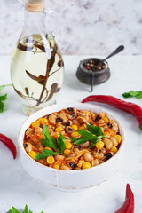 Chili con carne in a bowl. Mexican cuisine. Chili with meat, corn and beans
