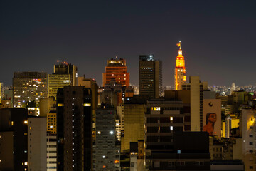 Fototapeta na wymiar São Paulo city center at night - Santander Building