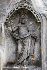 Historic Statue on the mystery old Prague Cemetery, Czech Republic
