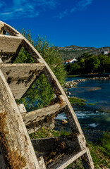 Old water wheel on the river