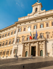 Fototapeta na wymiar Montecitorio Palace under a blue sky