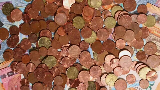 Stop Motion animation. Euro cash macro view. Financial Crisis. Texture. Finance Business Investment Success Concept. Euro money 50, 10, 20 euro bills and coins top view