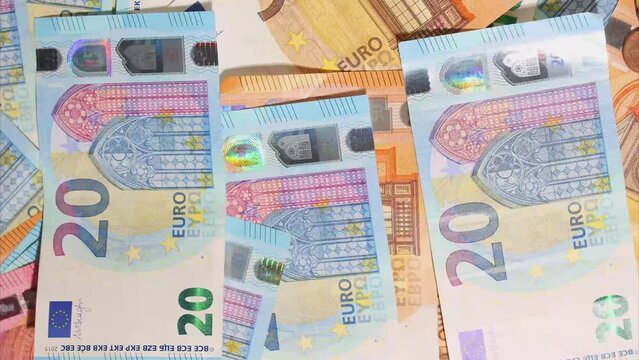 Stop Motion animation. Euro cash macro view. Financial Crisis. Texture. Finance Business Investment Success Concept. Euro money 50, 10, 20 euro bills view from the top