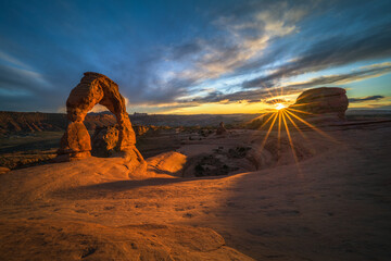 sunset at delicate arch, arches national park, usa