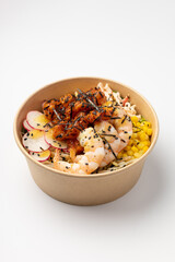 Poke with shrimp, corn and green onions on a white background