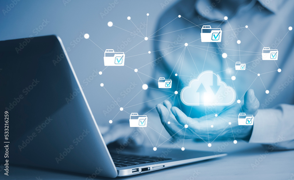 Poster businessman hold cloud icon and tablet with folder data information on the cloud computing technolog