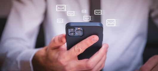 email marketing concept, person reading e-mail on smartphone, receive new message