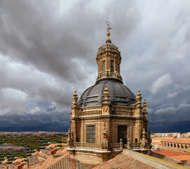 Dome of the church of La Clerecía in Salamanca from the top of one of its towers. Spectacular sky.