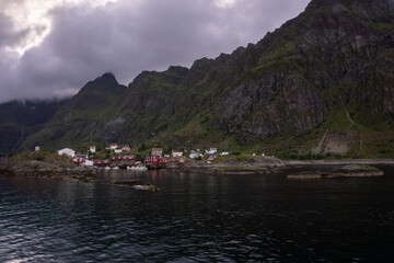 A I Lofoten, Sorvagen Norway - July 18, 2022: Beautiful scenery of A I Lofoten village and surroundings on the Lofoten Islands. Summer cloudy day. Selective focus.